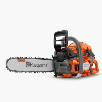 A studio product photo of an orange and grey Husqvarna petrol chainsaw with visible chain and guide bar.