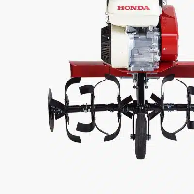 Honda-engined tiller rotavator, studio product shot showing tines