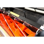 An extreme close-up shows the orange spiral cutting blades of a cylinder mower's reel.