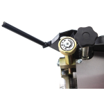 A close-up studio shot of a brass height-of-cut adjustment dial and black locking knob on a cylinder mower frame.