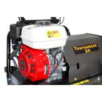 Close-up of the Honda-style petrol engine and 'Tournament 24' badge on a cylinder mower.