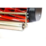 Close-up of the orange cutting reel, chrome front roller and chain drive on a cylinder mower.