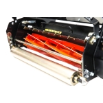 Close-up studio shot of a cylinder lawnmower's orange-bladed cutting reel and smooth front roller.
