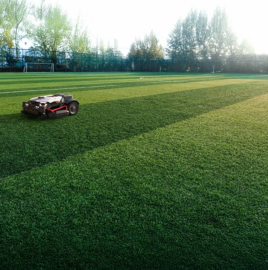 Even mowing stripes on a sports pitch maintained by a Kress robot