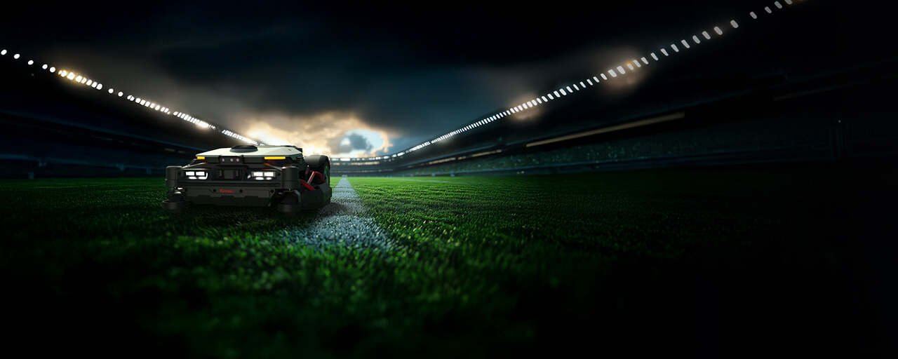 Kress robotic mower on a striped sports pitch